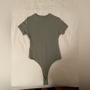 SKIMS cotton body suit